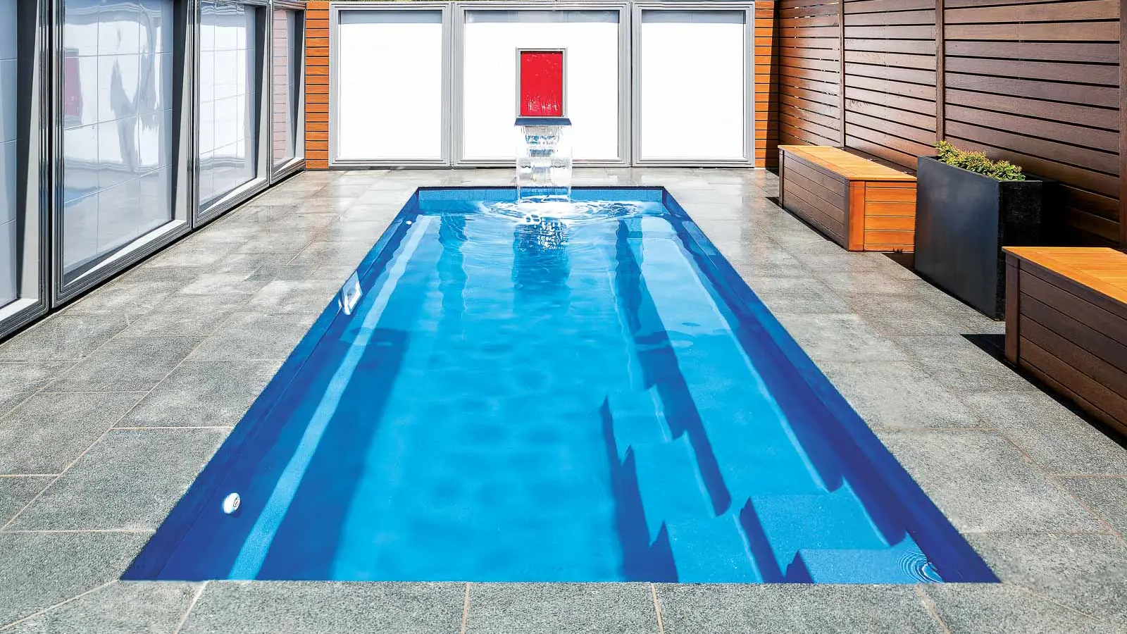 Leisure-Pools-Pinnacle-Fiberglass-Pool-Model-Hero The Esprit™, a fiberglass pool design manufactured by Leisure Pools